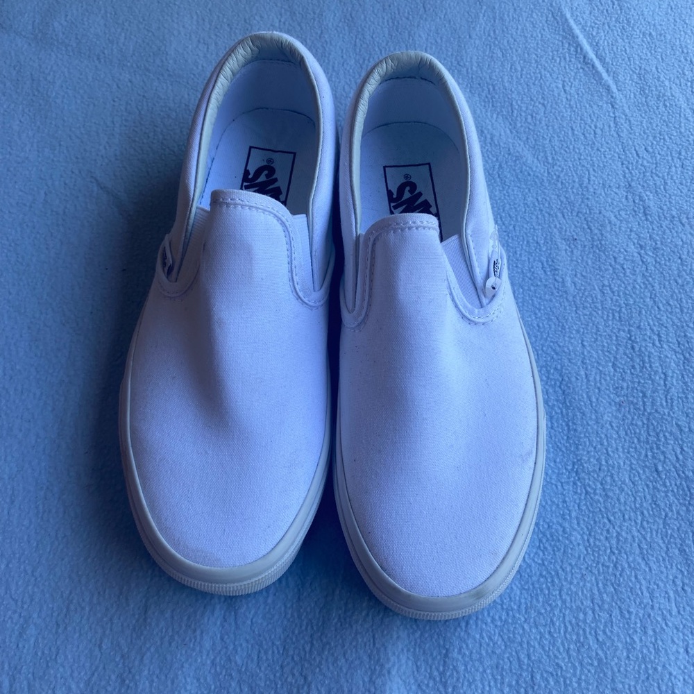 White slip on Vans
